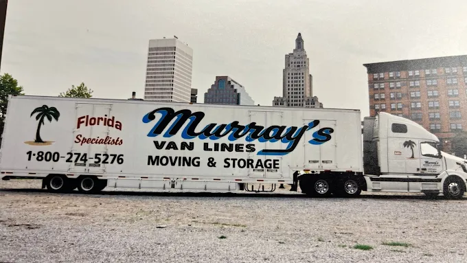 Murray's Van Lines moving and storage tractor-trailer parked below the Providence skyline