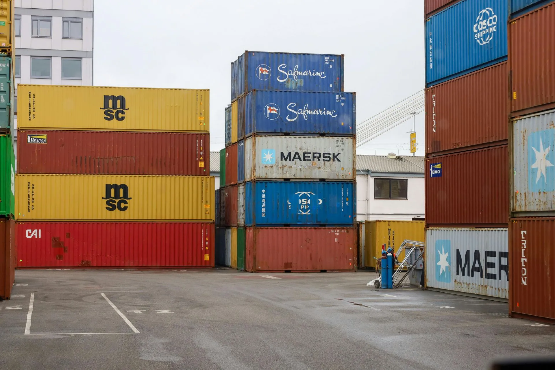 Shipping containers stacked in a freight yard